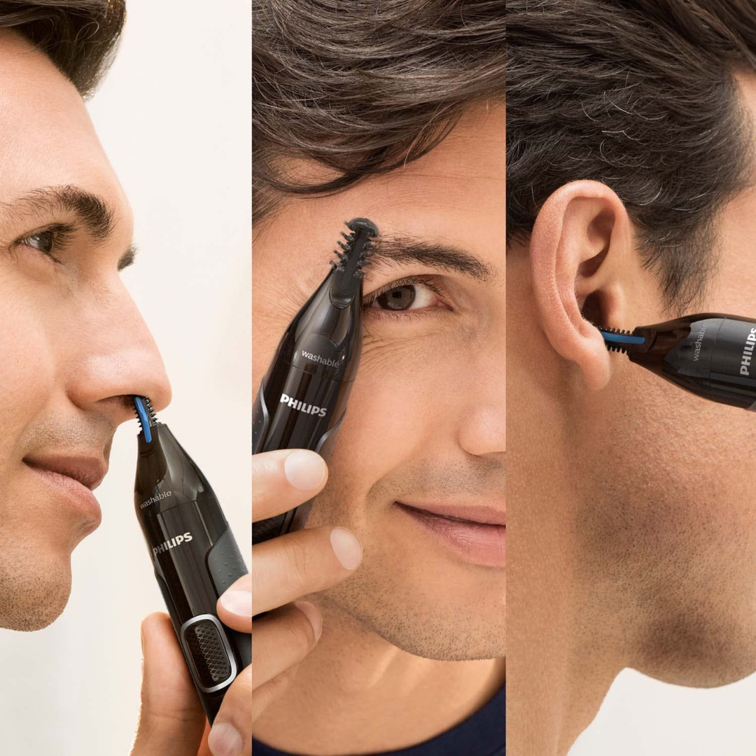 Philips NT3650 trimmer in use for precise grooming of nose and ears