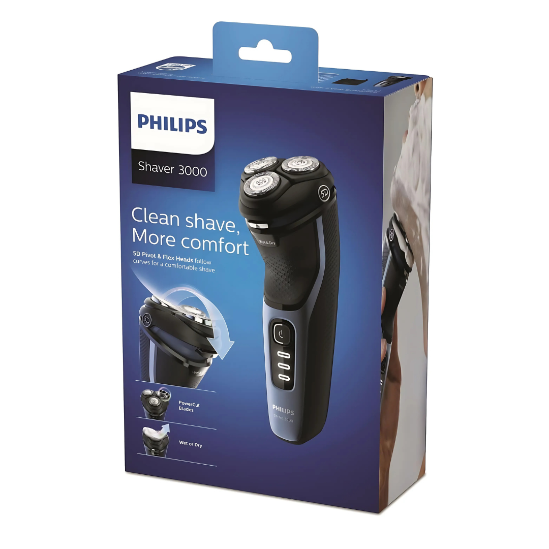 Philips S3232 electric shaver in hand, highlighting ergonomic design