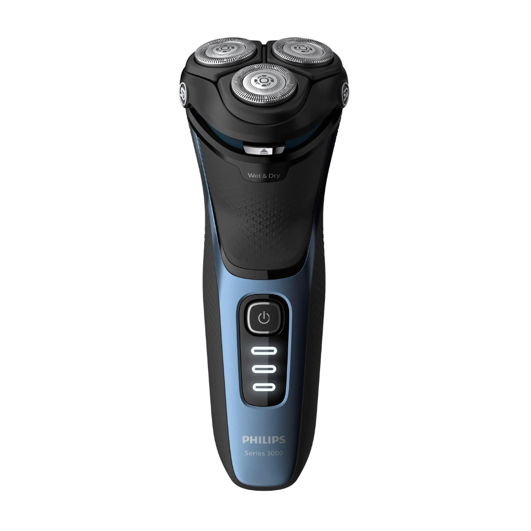 Philips S3232 electric shaver in hand, highlighting ergonomic design