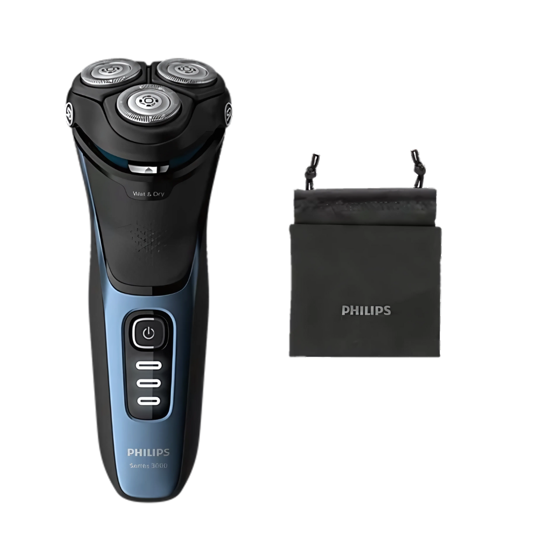 Philips S3232 electric shaver in hand, highlighting ergonomic design