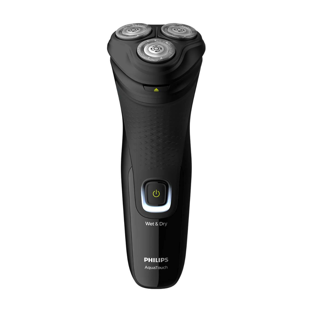 Philips S1223 electric shaver in hand, highlighting ergonomic design"