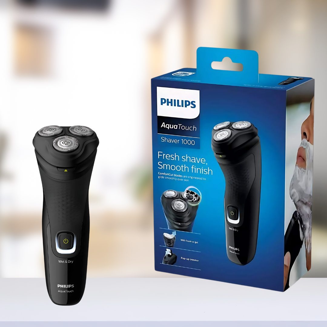 Philips S1223 electric shaver in hand, highlighting ergonomic design"